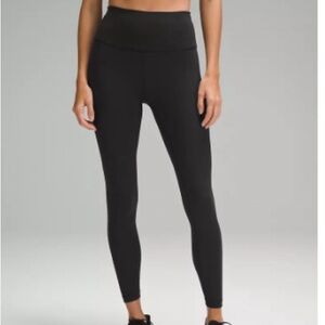 Size 6 black wunder under high rise graphic leggings 25”